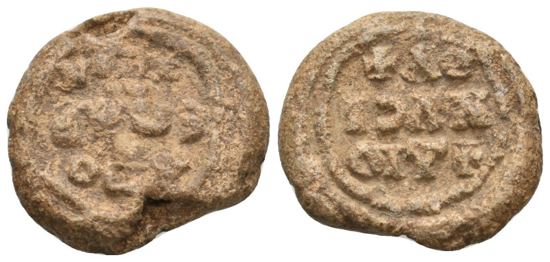 BYZANTINE LEAD SEALS.
12.79 Gr. 23.9 mm.