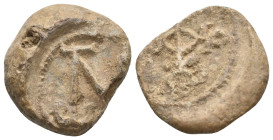 BYZANTINE LEAD SEALS.
12.86 Gr. 21.9 mm.