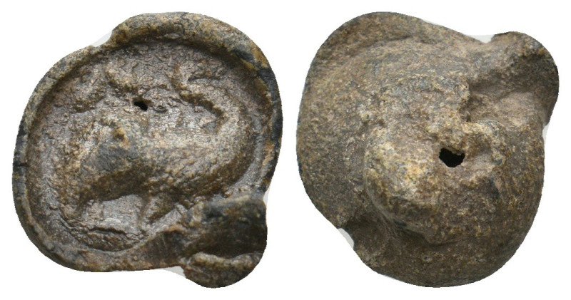 BYZANTINE LEAD SEALS.
3.24 Gr. 15.4 mm.