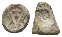 BYZANTINE LEAD SEALS.
4.66 Gr. 11.8 mm.