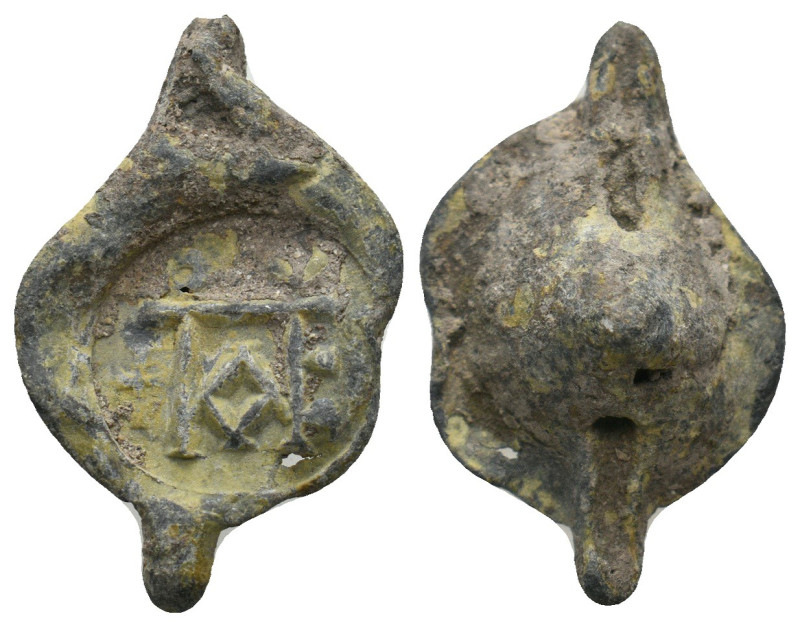 BYZANTINE LEAD SEALS.
5.56 Gr. 25.1 mm.