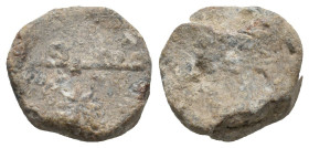 ISLAMIC LEAD SEALS.
5.64 Gr. 14.8 mm.