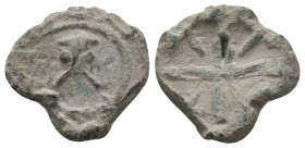 BYZANTINE LEAD SEALS.
5.82 Gr. 17.9 mm.