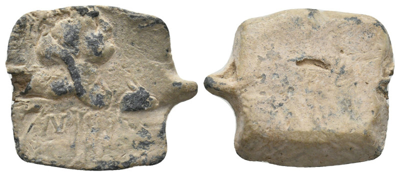 ROMAN LEAD SEALS.
8.54 Gr. 23.1 mm.