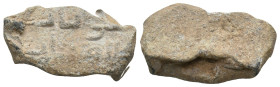 ISLAMIC LEAD SEALS.
12.58 Gr. 26.3 mm.