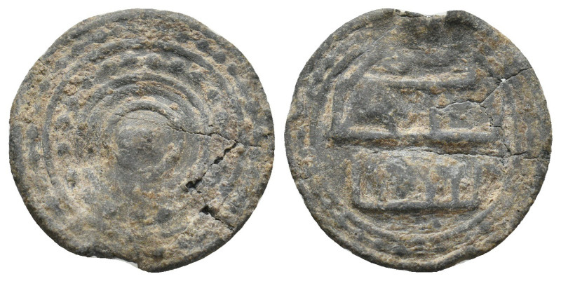 ISLAMIC LEAD SEALS.
2.25 Gr. 18 mm.