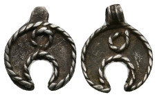 ANCIENT ROMAN SILVER PENDANT (1ST-3TH CENTURY AD) .
0.86 Gr. 14.2 mm.