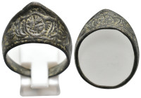 ANCIENT ISLAMIC BRONZE ARCHER RING.
6.23 Gr.