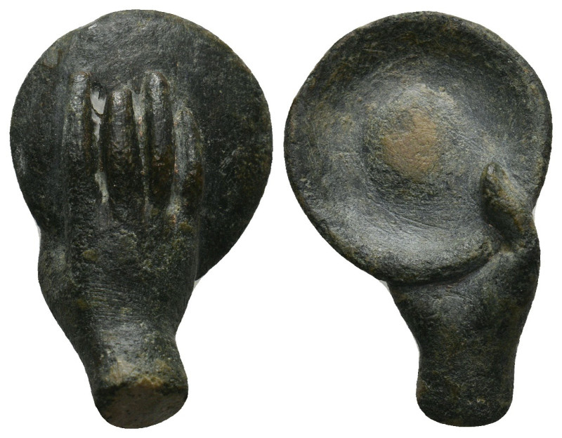 ANCIENT ROMAN BRONZE FIGURINE HAND HOLDING DISC.
8.35 Gr. 26.7 mm.