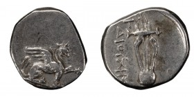 Ionia, Teos. Alexandria Diobol; Ionia, Teos; c. 320-294 BC, Diobol, 1.09g. Obv: Griffin seated r., raising l. forepaw. Rx: Lyre; THI above, ?IOYXHS do...