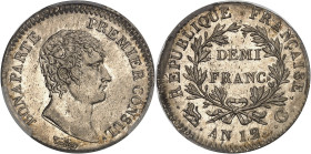 FRANCE
Consulat (1799-1804). Demi-franc Bonaparte An 12 (1803-1804), G, Genève.
Av. BONAPARTE PREMIER CONSUL. Tête nue à droite, au-dessous signature ...