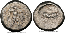 LUCANIA. Poseidonia. Ca. 470-420 BC. AR stater (18mm, 9h). NGC VF. ΠΟΣEI, Poseidon striding right, nude but for chlamys spread across shoulders, brand...