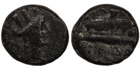 Phoenicia. Arados. (242-166 BC) Æ Bronze. (14mm, 4,29g) Obv: head of Tyche right. Rev: Athena standing left on prow.