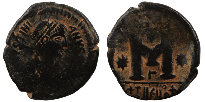 Justinian I. (527-565 AD) Æ Follis. (32mm, 13,81g) Theoupolis. Obv: D N IVSTINIA...