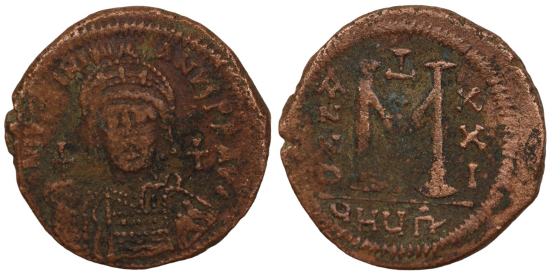 Justinian I. (527-565 AD) Æ Follis. (35mm, 18,13g) Theoupolis. Obv: crowned bust...