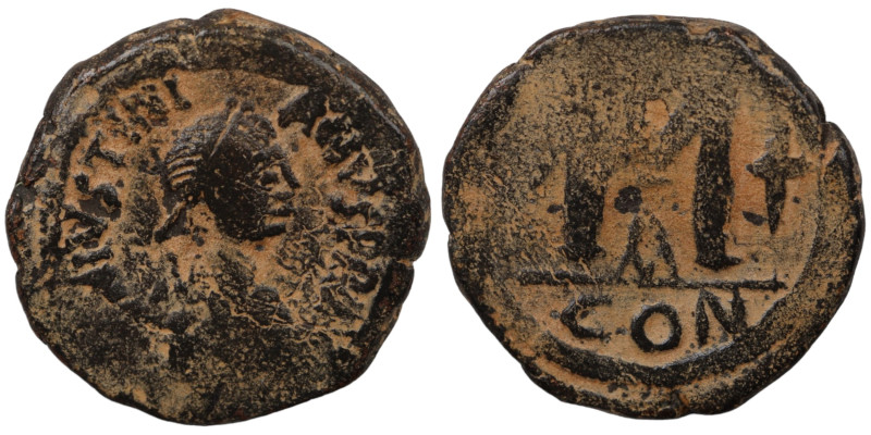 Justinian I. (527-565 AD) Æ Follis. (30mm, 18,63g) Theoupolis. Obv: D N IVSTINIA...