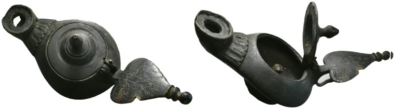 Weight 479.13 gr - 115 mm

ROMAN OIL LAMP.(3rd-4th century).Ae.