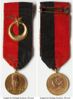 Abbas Hilmy II gilt copper Medal ND (1892-1914) VF (Harshly Cleaned), 22mm. 7.9gm. Medal with crescent and star upon red black ribbon. Scarce. From th...