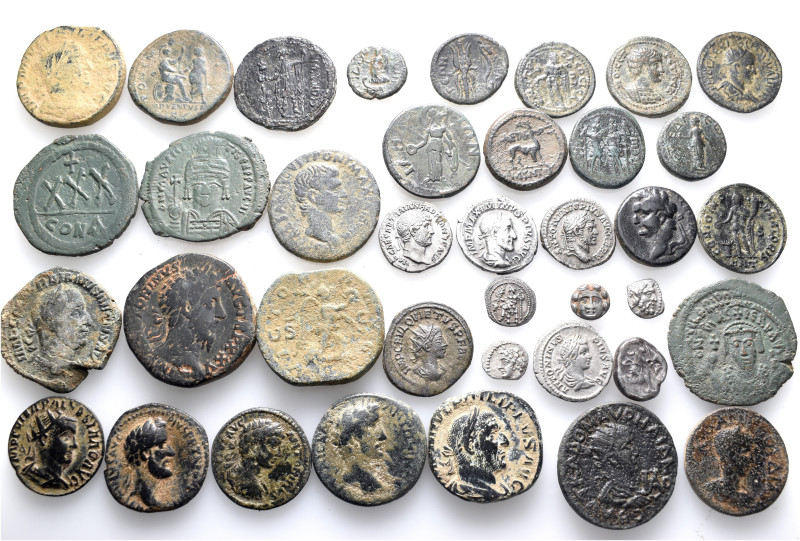 A lot containing 38 silver and bronze coins. Including: Greek, Roman Provincial,...