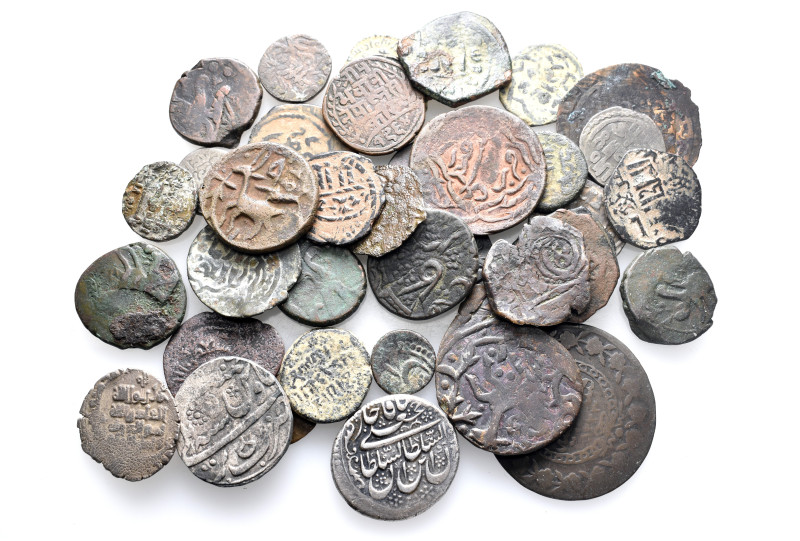 A lot containing 38 silver and bronze coins. All: Islamic. Fine to very fine. LO...