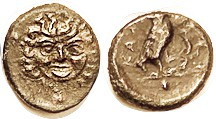 KAMARINA, Æ14 (Onkia), 420-405 BC, Facing Gorgon head/Owl stg r hldg lizard, 1 pellet, S1064; AEF/F, rev off-ctr & somewhat crude; dark brown patina; ...