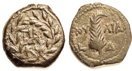 Valerius Gratus, 15-26 AD, Prutah, H-1338, Lgnd in wreath/Palm branch, L-Delta (Yr 4); F/AVF, nrly centered, smooth dark greenish patina, minor obv cr...