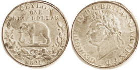 CEYLON, Rixdollar 1821, Geo IV bust l./elephant in wreath, 27 mm; VG-F but murky surface characteristic of ex-jewelry; ltly toned.