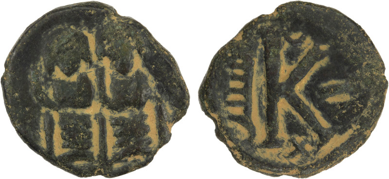 ARAB-BYZANTINE: Justin & Sophia type, late 7th century, AE 1/2 follis (3.23g), B...