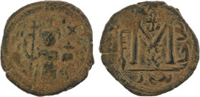 ARAB-BYZANTINE: Standing Emperor, ca. 670s/680s, AE fals (4.25g), Baysan (= Skythopolis), ND, A-3521B, standing emperor, holding long cross and globus...