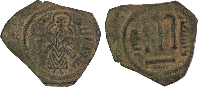 ARAB-BYZANTINE: Standing Caliph, ca. 692-705, AE fals (2.94g), Iliya (Jerusalem)...