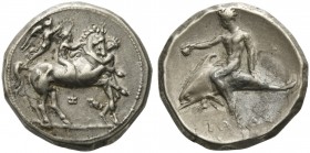 Apulia, Tarentum, Nomos, ca. 340-332 BC; AR (g 7,90; mm 21; h 12); Horseman galloping r., crowned by Nike; horse restrained at neck by groom; below, I...