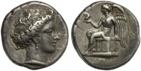 Bruttium, Terina, Stater, ca. 300-356 BC; AR (g 7,63; mm 19; h 2); TEPINAIΩN, female head r., with elaborate hair, wearing triple pendant earrings an ...