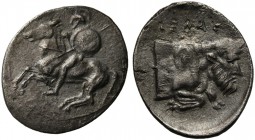 Sicily, Gela, Litra, ca. 430-425 BC; AR (g 0,69; mm 13; h 12); Warrior riding horse l., holding shield and spear, Rv. ΓΕΛΑΣ, forepart of man-headed bu...