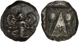 Caria, Kaunos, Stater, ca. 430-410 BC; AR (g 11,08; mm 22; h 12); Winged female figure in kneeling-running stance l., head right, holding kerykeion an...