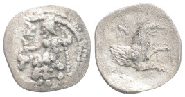 Lykaonia, Laranda AR Obol. Circa 324/3 BC. Baaltars seated left, holding grain ear, grape bunch, and scepter / Forepart of wolf right; inverted cresce...