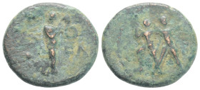 PISIDIA, Etenna. 1st century BC. Æ (3,7 gm; 18,2 mm). Two men running left, holding curved knives / Nymph advancing right, head left, holding coiled s...
