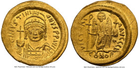 Justinian I the Great (AD 527-565). AV solidus (20mm, 4.35 gm, 7h). NGC Choice AU 4/5 - 2/5, graffiti. slightly bent, clipped. Constantinople, 4th off...