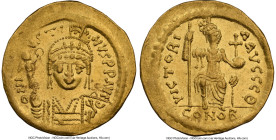 Justin II (AD 565-578). AV solidus (20mm, 4.39 gm, 5h). NGC AU 5/5 - 4/5, clipped. Constantinople, 9th officina. D N IVSTI-NVS PP AVG, pearl-diademed,...