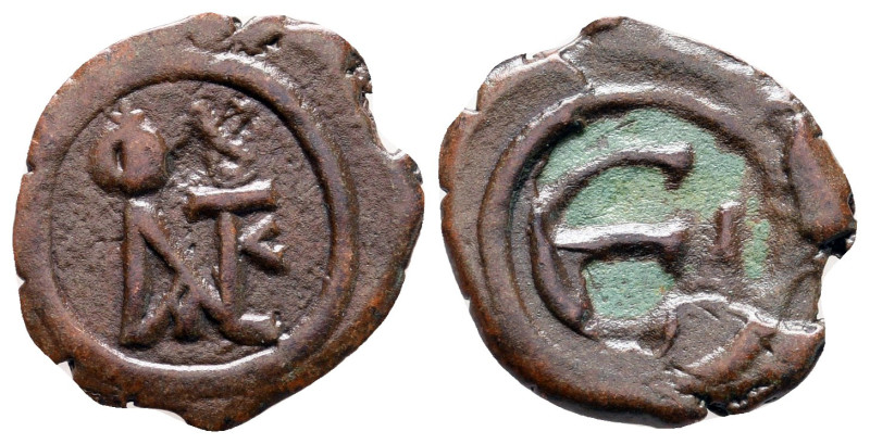 Justin II AD 565-578. Constantinople
Pentanummium Æ

16 mm, 1,22 g



Ver...