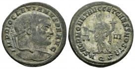 Diocleciano. Follis. 302-305 d.C. Aquileia. (Spink-12820). (Ric-35a). Rev.: SACR MONET AVGG ET CAESS NOSTR. Moneta en pie a izquierda con balanza y cu...