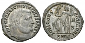 Licinio I. Follis. 313-17 d.C. Nicomedia. (Spink-15216). (Ric-15). Rev.: IOVI CONSERVATORI. Júpiter en pie a izquierda con Victoria sobre globo y cetr...