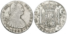 Carlos IV (1788-1808). 8 reales. 1800. Lima. IJ. (Cal-655). Ag. 27,29 g. Hojita en el reverso. Golpecitos en el canto. MBC. Est...75,00.