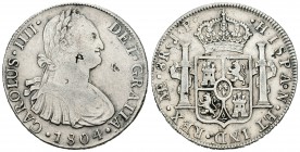 Carlos IV (1788-1808). 8 reales. 1804. Lima. JP. (Cal-661). Ag. 26,74 g. Pequeños resellos orientales. MBC. Est...70,00.