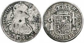Carlos IV (1788-1808). 8 reales. 1795. México. FM. (Cal-689). Ag. 26,73 g. Resellos orientales. BC+. Est...55,00.