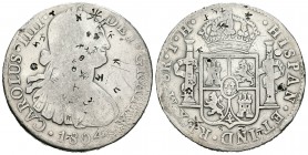 Carlos IV (1788-1808). 8 reales. 1804. México. TH. (Cal-701). Ag. 26,64 g. Resellos orientales. BC. Est...55,00.