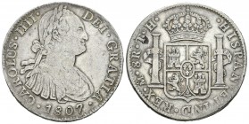 Carlos IV (1788-1808). 8 reales. 1807. México. TH. (Cal-707). Ag. 26,75 g. Hoja en reverso. MBC-. Est...45,00.