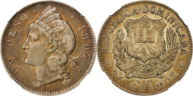 DOMINICAN REPUBLIC. Peso, 1897-A. Philadelphia Mint. NGC AU-53.
KM-16. Wonderful amber gray patina is a true pleasure to examine under light. Smooth ...