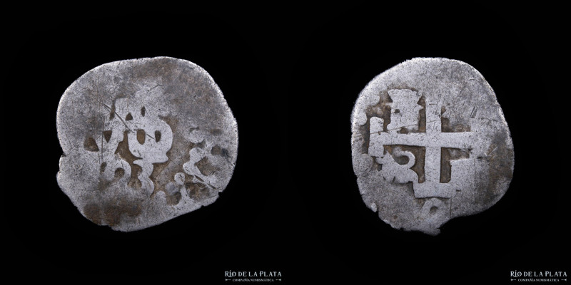 Lima. Felipe V (1700-1724) 1/2 Real 1723. Macuquina. AG930; 16mm; 1.40g. CJ 37.2...