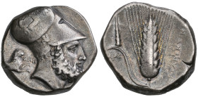 ‡ Italy, Lucania, Metapontum, distater, c. 340-330 BC, head of Leukippos right wearing Corinthian helmet, the bowl decorated with Nike driving quadrig...