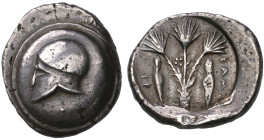 ‡ Sicily, Kamarina, didrachm, c. 492-485 BC, Corinthian helmet left on circular shield, rev., ΚΑΜΑ-ΡΙ (retrograde), three fan-shaped branches of a dwa...